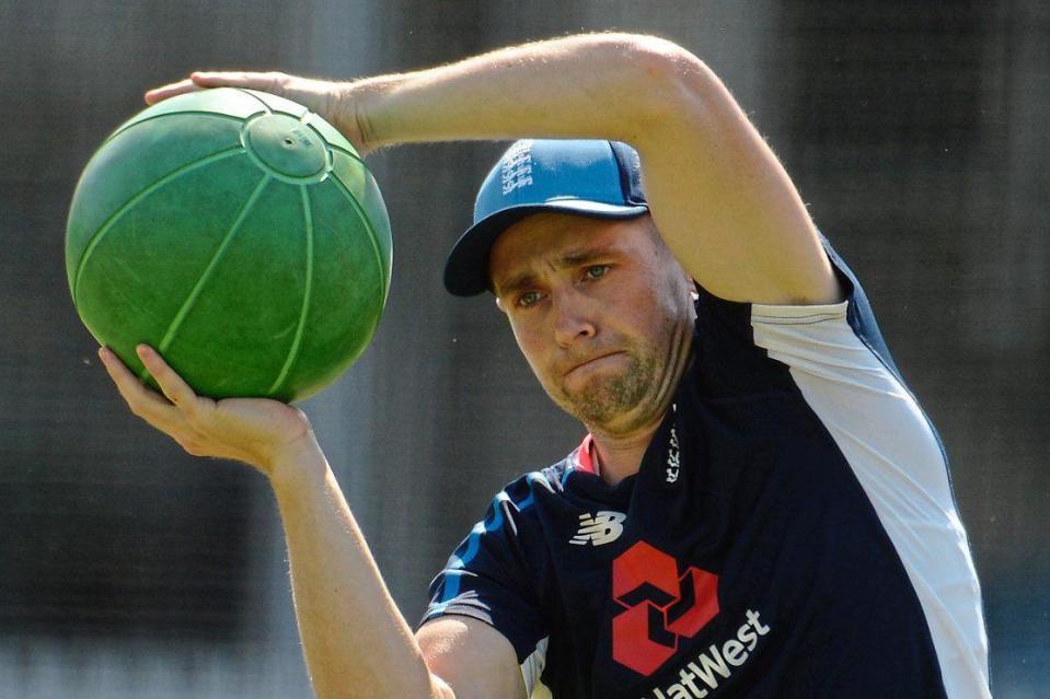 Having a ball | Chris Woakes feels the strain during an England training session ahead of the First Test: Getty Images