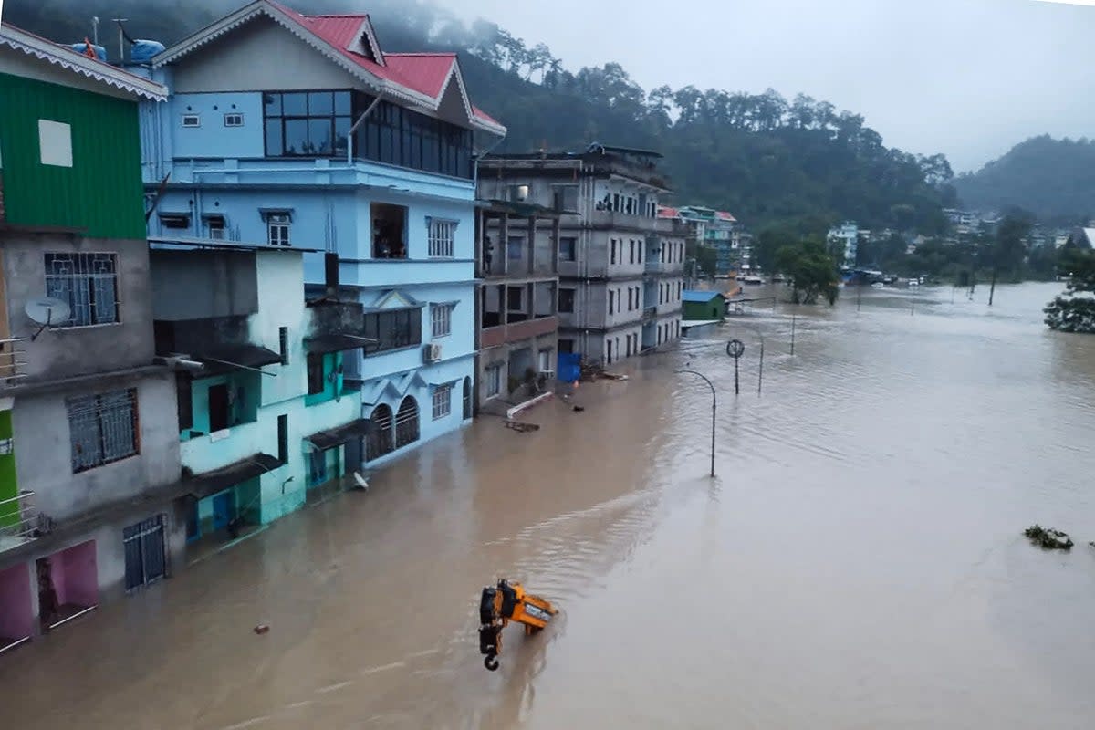 A flooded street in Lachen Valley, in India’s Sikkim state  (INDIAN ARMY/AFP via Getty Images)