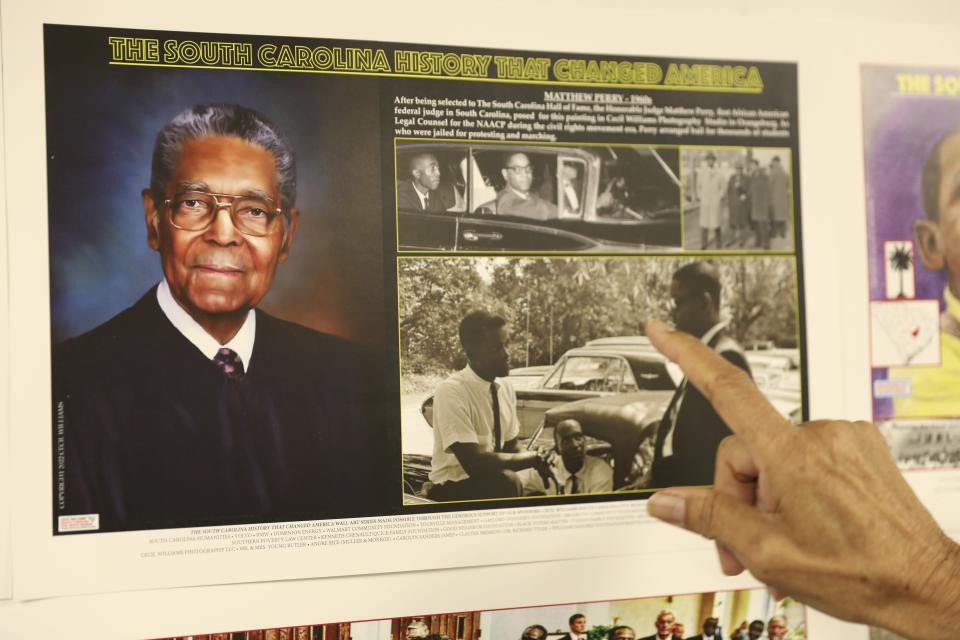 A display to honor federal judge Matthew Perry is shown by South Carolina civil rights photographer Cecil Williams at his museum, the only civil rights museum in the state, on Tuesday, Dec. 12, 2023, in Orangeburg, South Carolina. (AP Photo/Jeffrey Collins)