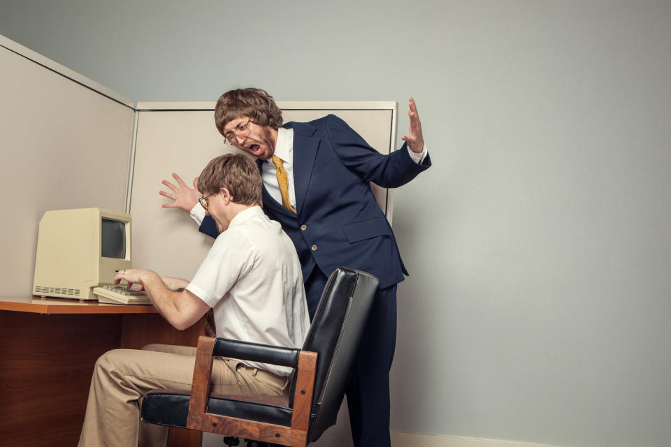 A professor yelling at a student