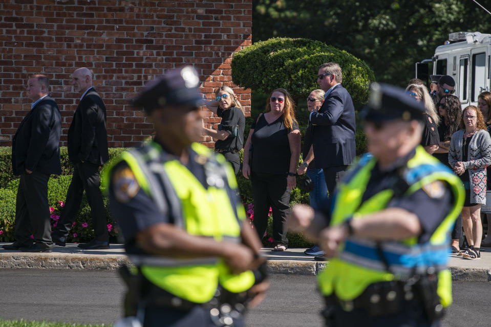 People attend the funeral service of Gabby Petito at Moloney's Funeral Home in Holbrook, N.Y. Sunday, Sept. 26, 2021. (AP Photo/Eduardo Munoz Alvarez)