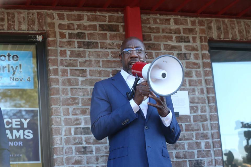 US Senator Raphael Warnock speaks during a campaign event on Tuesday October 25, 2022.