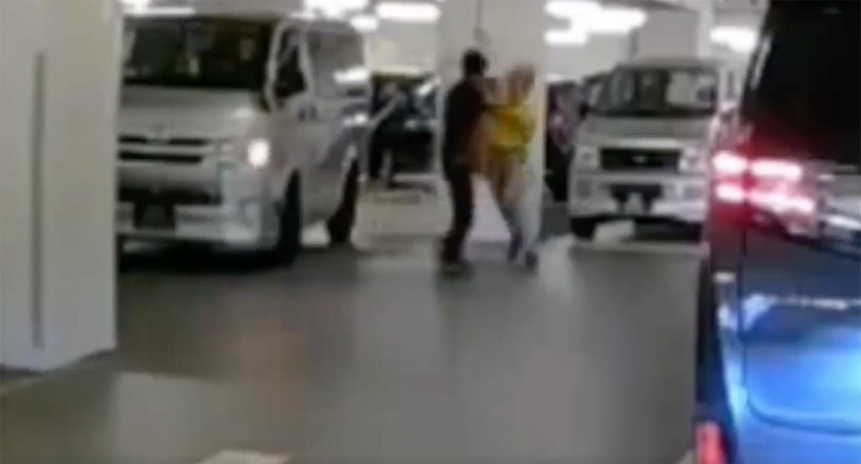 A screengrab from the video of the fight that took place in the car park of Chinatown Point. (Source: Stomp)