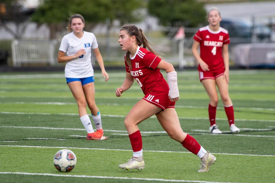 Hunter Hill dribbles upfield Monday vs. Brevard. She's one of 19 players who have scored a goal this season for the Bearcats. Maya Carter/Asheville Citizen Times