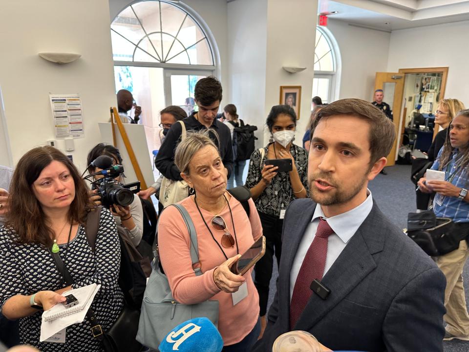 New College of Florida board member Christopher Rufo speaks with reporters before a meeting on campus Wednesday. Rufo said a fellow board member received a death threat before the meeting.