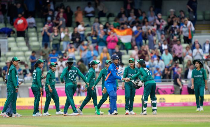 India’s Smriti Mandhana shakes hands with Pakistan players (AP)