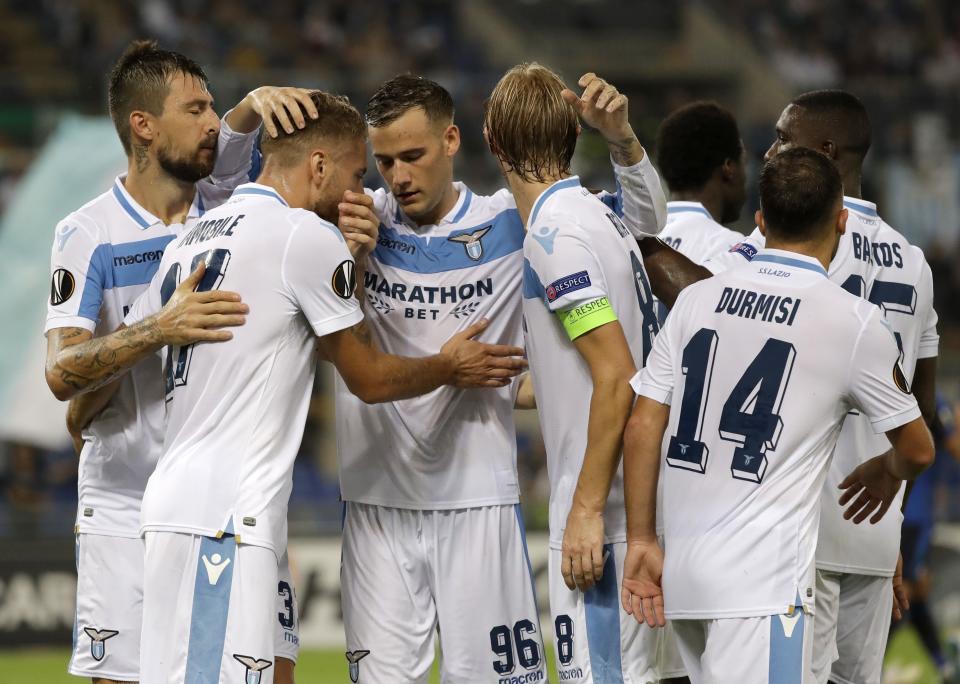 Lazio's Ciro Immobile, left, celebrates with teammates after scoring during an Europa League, group H, soccer match between Lazio and Apollon Limassol, in Rome, Thursday, Sept. 20, 2018. (AP Photo/Andrew Medichini)