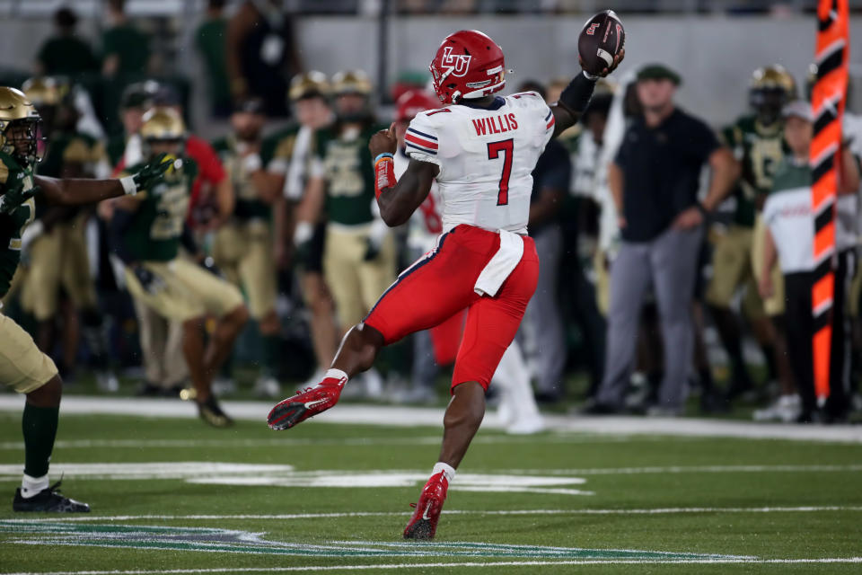 Liberty quarterback Malik Willis is a fascinating prospect with unique skills. (Photo by Michael Wade/Icon Sportswire via Getty Images)