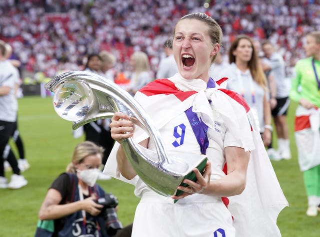 England’s Ellen White with the trophy following victory over Germany in the Women's Euros.
