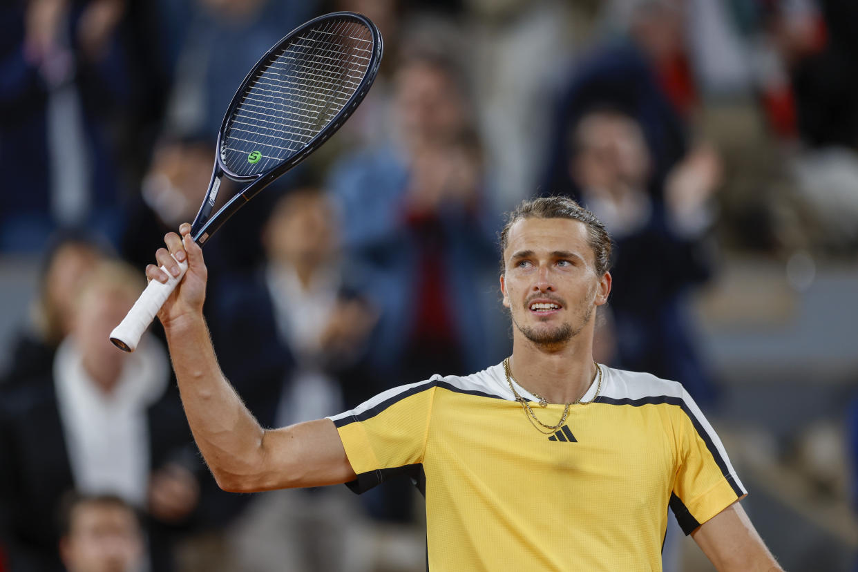 Germany's Alexander Zverev celebrates winning his quarterfinal match of the French Open tennis tournament against Australia's Alex De Minaur at the Roland Garros stadium in Paris, Wednesday, June 5, 2024. (AP Photo/Jean-Francois Badias)