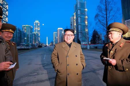 FILE PHOTO: North Korean leader Kim Jong Un provides field guidance at the construction site of Ryomyong Street in this undated picture provided by KCNA in Pyongyang on March 16, 2017. KCNA/via Reuters