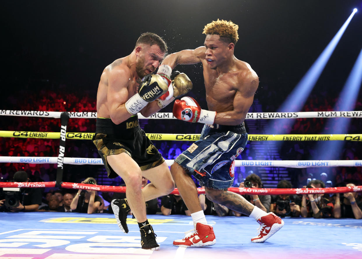 LAS VEGAS, NEVADA - MAY 20: Vasiliy Lomachenko (L) and Devin Haney (R) exchange punches during their Undisputed lightweight championship fight at MGM Grand Hotel & Casino on May 20, 2023 in Las Vegas, Nevada. (Photo by Mikey Williams/Top Rank Inc via Getty Images)