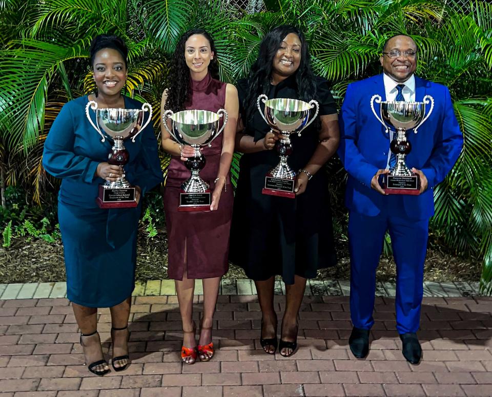 Kathy Suarez, school-related employee of the year; Joselyn Leon, teacher of the year; Caelethia Taylor, assistant principal of the year; and Dwayne Dennard, principal of the year.