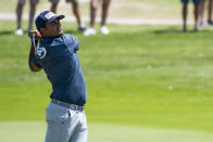 Sebastián Muñoz, of Colombia, hits a shot on the 18th hole during the first round of the AT&T Byron Nelson golf tournament in McKinney, Texas, on Thursday, May 12, 2022. (AP Photo/Emil Lippe)