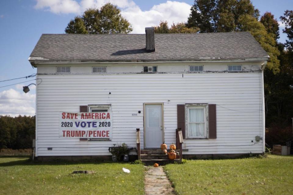 A sign supporting Donald Trump and Mike Pence hangs on a house in Lordstown, Ohio.