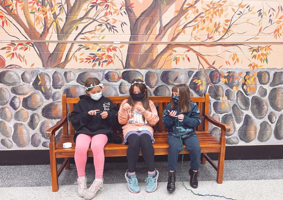 Fourth graders Mya Silva, Ellery McPherson and Savannah France at Dogwood Elementary School, Nov. 18, 2021. The schools’ PTO purchased little crochet kids for students so they can work on projects during their free time in their regular classroom.