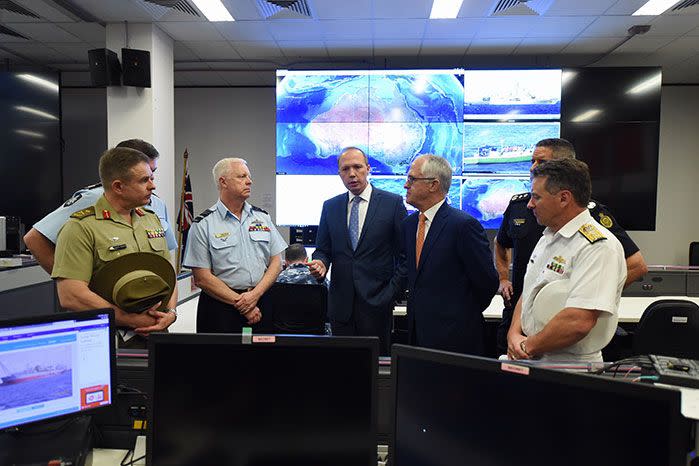 Australia's Prime Minister Malcolm Turnbull and Australia's Immigration Minister Peter Dutton speaking in Canberra. Image: AAP