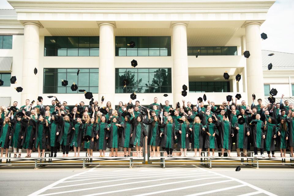 The Arkansas Colleges of Health Education's first class of doctors of osteopathic medicine graduated on May 15.