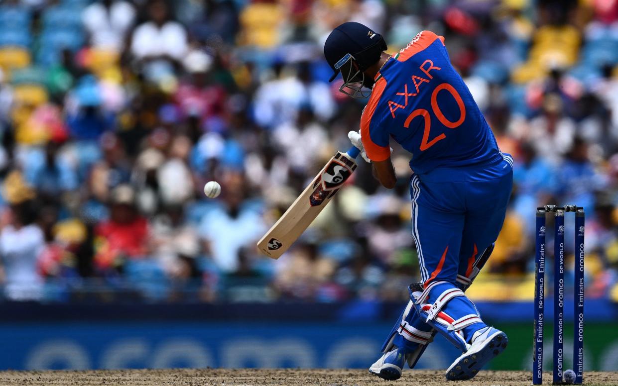 Axar Patel launches the ball into the air