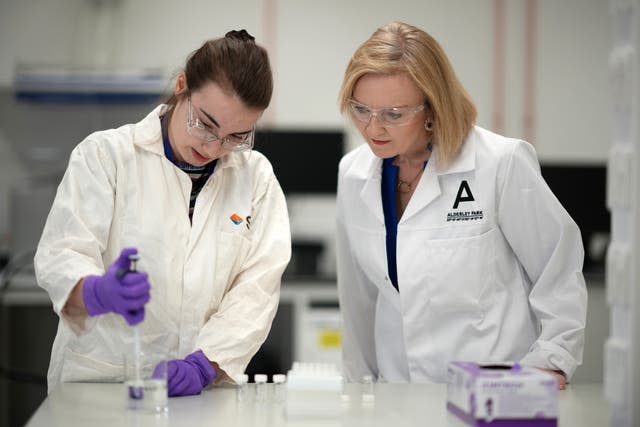 Liz Truss speaks to scientists during a campaign visit to a life sciences laboratory at Alderley Park in Manchester