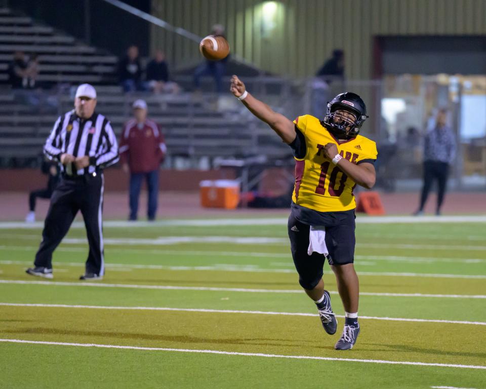 Tulare Union quarterback Jordan Crisp passes for a two point conversion against San Luis Obispo in a 2023 Central Section Division II high school football playoff game at Bob Mathias Stadium on Friday, November 3, 2023.