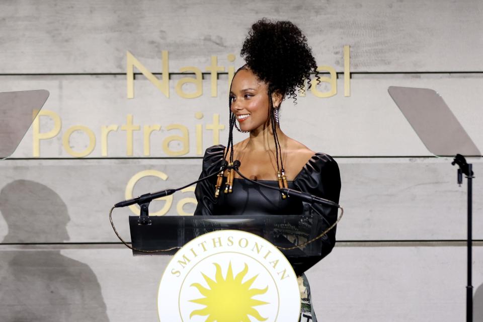 Alicia Keys introduces Clive Davis at the gala.