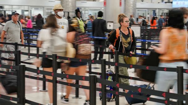 PHOTO: Passengers navigate the security checkpoint before their flights at Hartsfield-Jackson Atlanta International Airport in Atlanta, June 28, 2022.  (Elijah Nouvelage/Reuters)