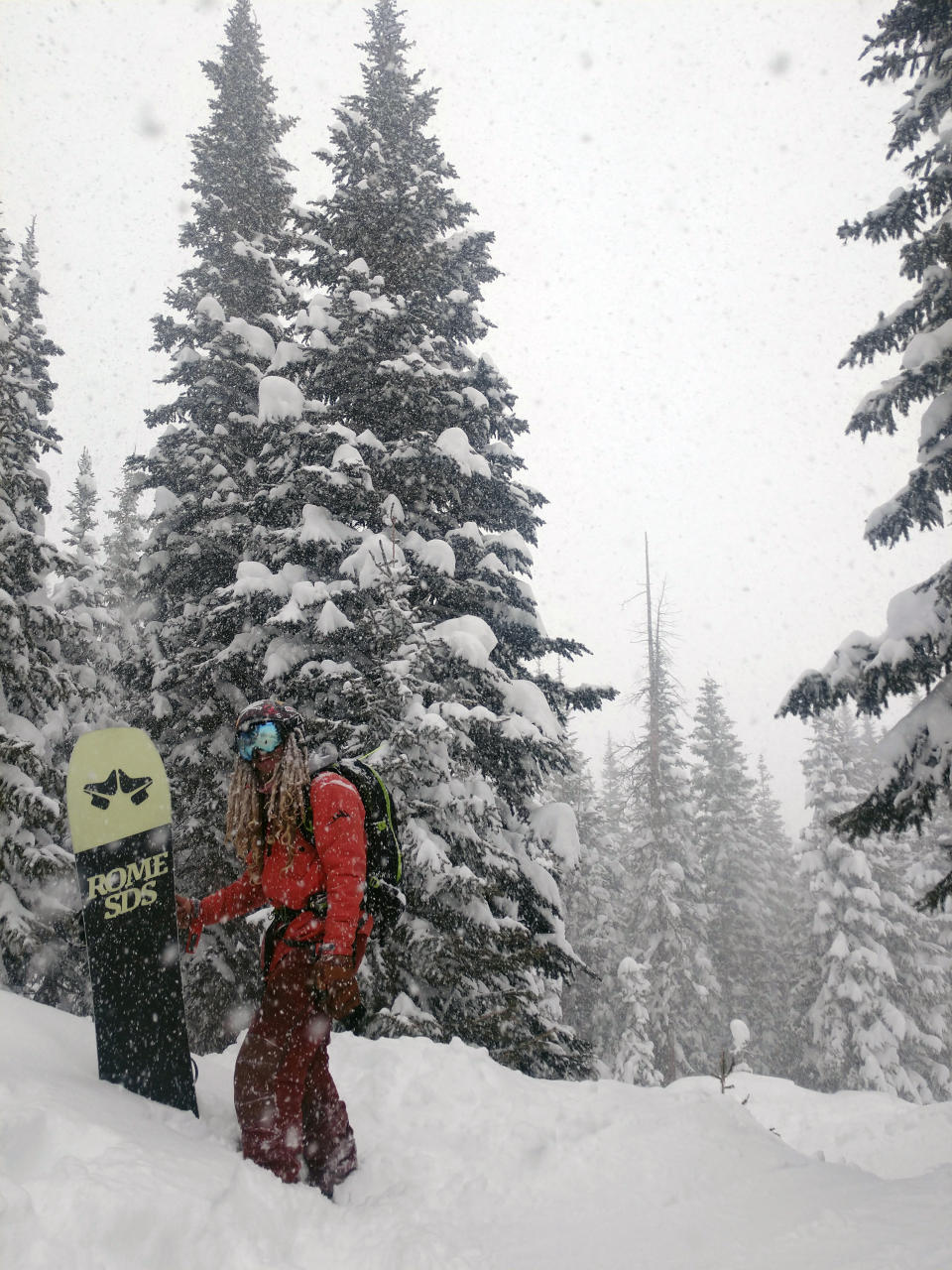 In this photo provided by Breezy Visin, snowboarder Maurice Kervin is shown at the Wolf Creek Ski Area near Pagosa Springs, Colo., Tuesday, Jan. 26, 2021. Caught in an avalanche last month, the 25-year-old deployed his airbag to help stay on the surface of the snow debris and rode out a slide powerful enough to bury a house. Once he finally — and safely — stopped, Kervin let out a piercing scream. (Breezy Visin via AP)