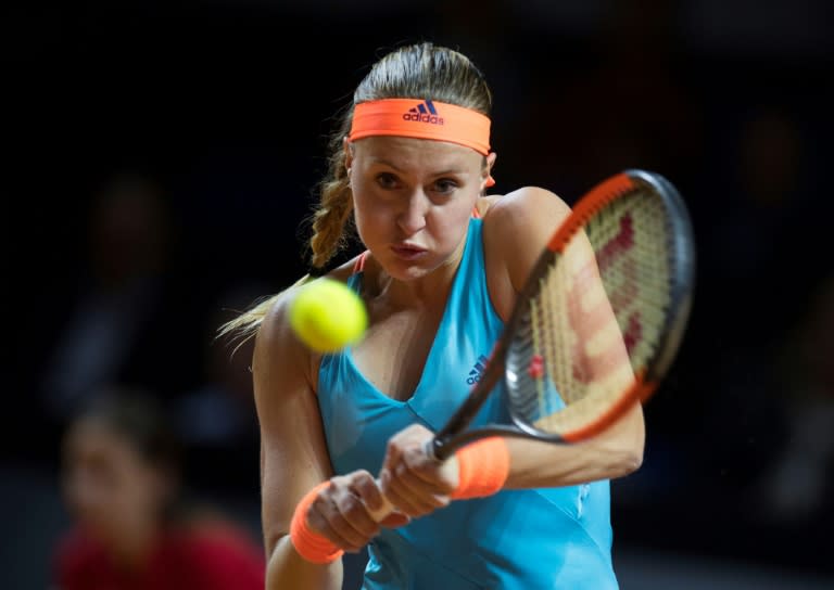 France's Kristina Mladenovic returns to Spain's Carla Suarez Navarro during their quarterfinal match at the WTA Tennis Grand Prix in Stuttgart, southwestern Germany, on April 28, 2017