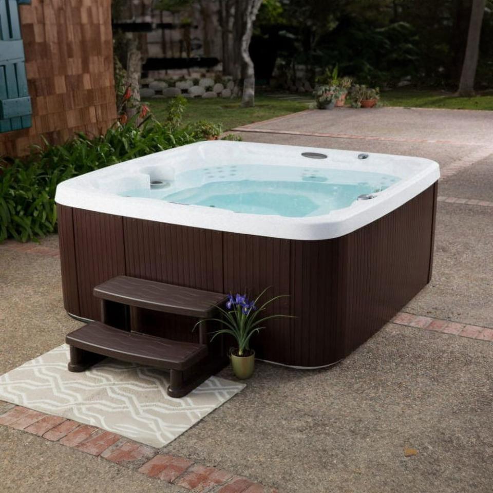 <p><a href="https://go.redirectingat.com?id=74968X1596630&url=https%3A%2F%2Fwww.walmart.com%2Fip%2FLifeSmart-Coronado-LS600DX-Hot-Tub-7-Person-65-Jet-220v-Spa-Sea-Salt-Espresso-Brown%2F1010798548&sref=https%3A%2F%2Fwww.popularmechanics.com%2Fhome%2Fg37257073%2Fbest-hot-tubs%2F" rel="nofollow noopener" target="_blank" data-ylk="slk:Shop Now;elm:context_link;itc:0;sec:content-canvas" class="link ">Shop Now</a></p><p>Coronado Seven-Person Hot Tub</p><p>walmart.com</p><p>$4299.99</p>