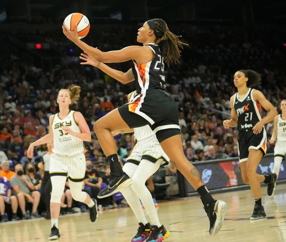 Aug 14, 2022; Phoenix, Ariz. U.S.;  Phoenix Mercury guard Jennie Simms (25) lays the ball up against the Chicago Sky during the first quarter at Footprint Center. Mandatory Credit: Michael Chow-Arizona Republic