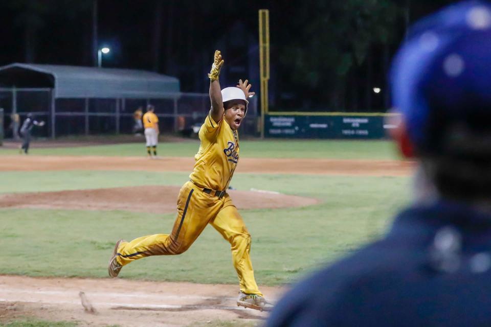 Savannah Bananas outfielder Ty Jackson celebrates after hitting his first home run at Grayson Stadium during the CPL championship game on Friday, Aug. 5, 2022, against the Wilson Tobs.