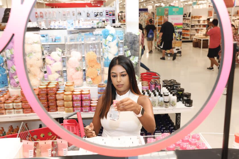 Los Angeles, CA - September 07: Shamita Jayakumar browses the beauty products while shopping at Target as she does about every other week at the Jefferson Blvd location on Wednesday, Sept. 7, 2022 in Los Angeles, The 32-year-old Santa Monica tech worker is among a generation of women who views their Target runs as a self-care ritual of sorts - the type of dedicated alone time you might get on a solo hike or while getting a massage, but under the guise of errands so it's easier to carve out. CA. (Dania Maxwell / Los Angeles Times)