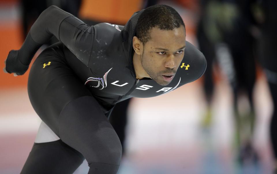 Speedskater Shani Davis of the U.S. trains at the Adler Arena Skating Center during the 2014 Winter Olympics in Sochi, Russia, Friday, Feb. 7, 2014. (AP Photo/Patrick Semansky)