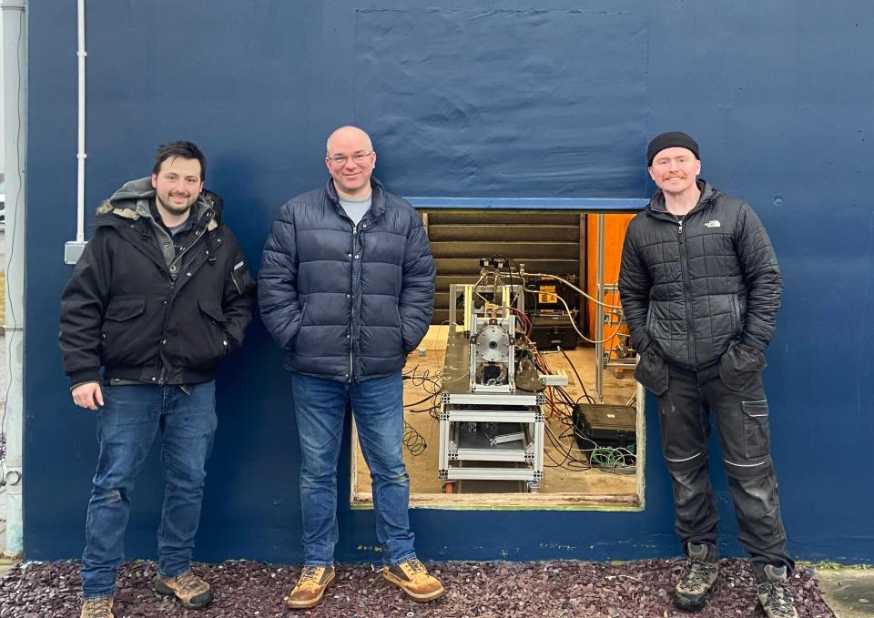 Krzysztof Bzdyk, left, at the University of Glasgow in the UK and his colleagues Patrick Harkness and Jack Tufft have built a small prototype of a rocket engine that eats its own fuel tank.