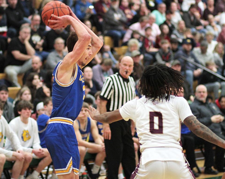 Harrison Gregory fires a pass off to a teammate against Niles-Brandywine on Wednesday.