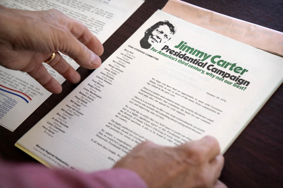 Richard Bender holds paperwork for then-Georgia governor Jimmy Carter from a precinct caucus kit for the 1976 Iowa Democratic Party caucuses at his home, Thursday, Dec. 14, 2023 in Silver Spring, Md. In 1972 Bender, a then-25-year-old anti-Vietnam War activist, helped engineer the modern Iowa caucuses and did the statewide counting via a pair of phone lines. (AP Photo/Mark Schiefelbein)