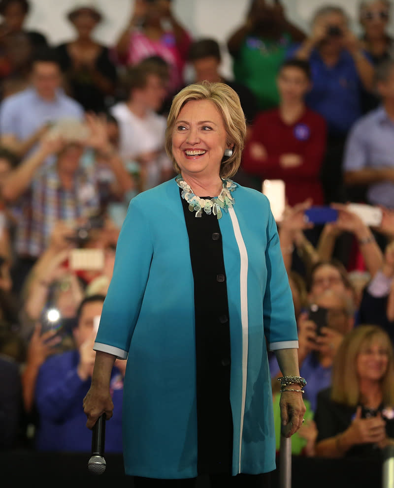 Hillary Clinton in a turquoise jacket on October 2, 2015