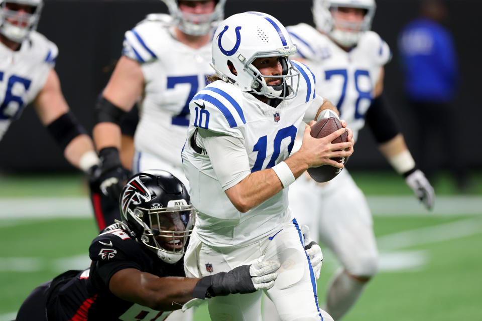 ATLANTA, GEORGIA – DECEMBER 24: Gardner Minshew #10 of the Indianapolis Colts is sacked by Zach Harrison #96 of the Atlanta Falcons during the fourth quarter at Mercedes-Benz Stadium on December 24, 2023 in Atlanta, Georgia. (Photo by Kevin C. Cox/Getty Images)