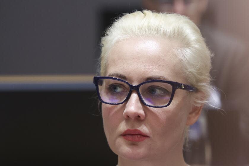 Yulia Navalnaya, wife of Russian opposition leader Alexei Navalny, joins a meeting of EU foreign ministers at the European Council building in Brussels, Monday, Feb. 19, 2024. European Union foreign ministers on Monday will discuss, among other issues, the situation in the Middle East and Russian aggression against Ukraine. (Yves Herman, Pool Photo via AP)