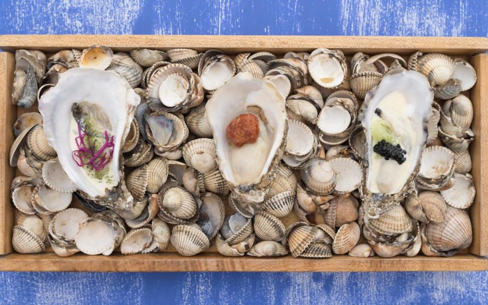 The sportsman has built a reputation for it's sublime seafood selection. Pictured here is a poached oyster with rhubarb rose and seaweed, oyster with hot chorizo and poached oyster with buerre blanc pickled cucumber and aruga caviar - Credit: Andrew Crowley