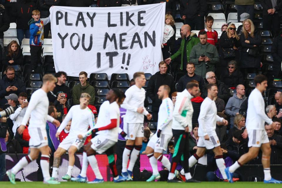 United fans display a banner to the players ahead of a visit to Fulham last season (Getty Images)