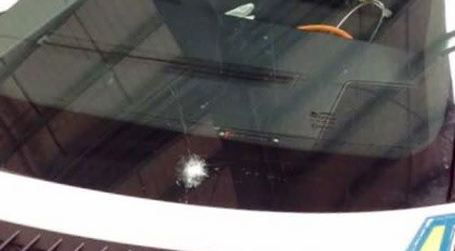 QAS said someone threw a rock from an overpass at the M1 on the Gold Coast at an ambulance. Source: QAS