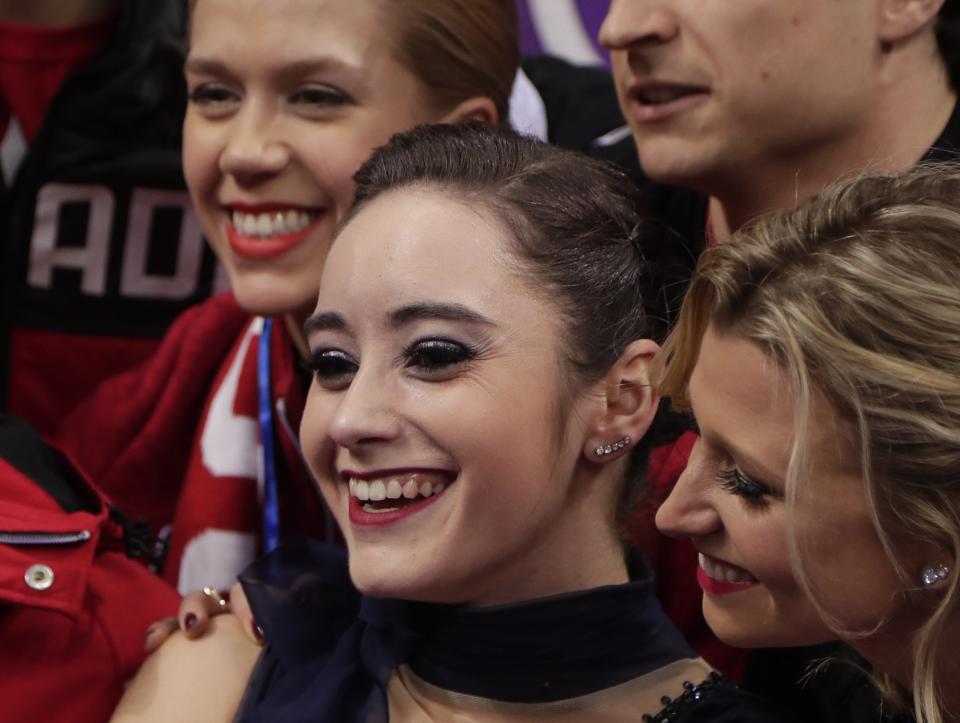 <p>Osmond, surrounded by her teammates as she waits for her score following her performance in the ladies single figure skating short program in the Gangneung Ice Arena at the 2018 Winter Olympics in Gangneung, South Korea, Sunday, Feb. 11, 2018 (AP) </p>