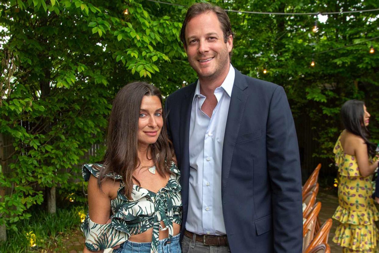 <p>Mark Sagliocco/Getty</p> Candice Miller and Brandon Miller attend Hamptons Magazine Celebrates Our Best Dressed With A Private Dinner At Dopo La Spiaggia on June 01, 2019 in East Hampton, New York. 