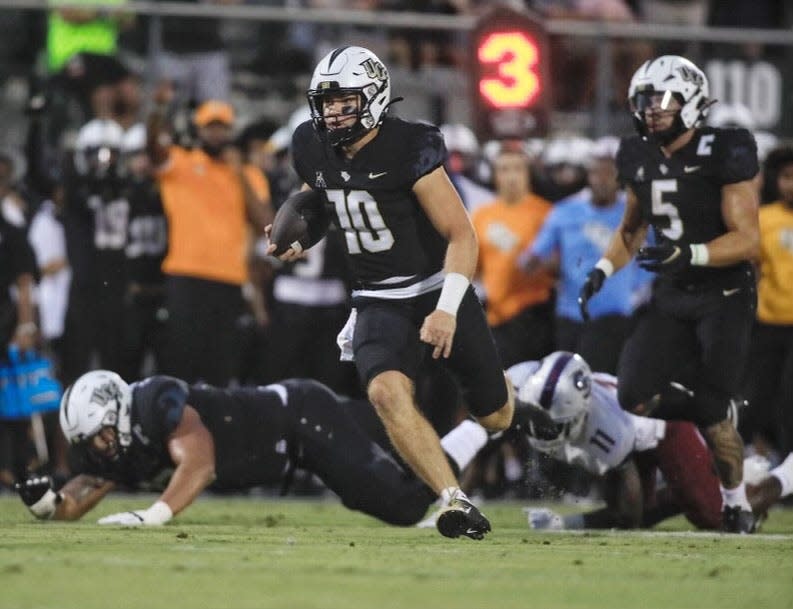 John Rhys Plumlee (10) threw two touchdowns and ran for another in the first quarter in UCF's win over South Carolina State on Thursday, Sept. 1, 2022.