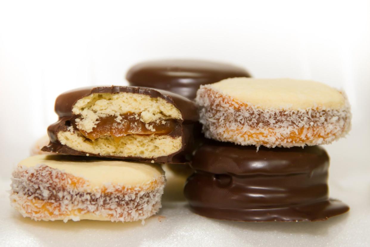 varied alfajores stacked