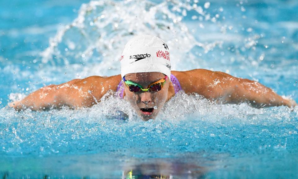 <span>Emma McKeon in action during the 100m butterfly in the Olympic trials in Brisbane. </span><span>Photograph: Dave Hunt/AAP</span>