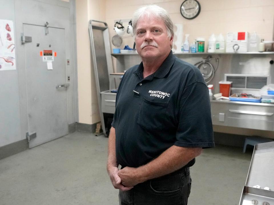 Curt Green, coroner of Manitowoc County in Manitowoc, in the county morgue on Sept. 7, 2023. Green, who has experienced gun suicides and gun homicides in his personal life and professionally as corner, is a big believer in having data guide decision-making.