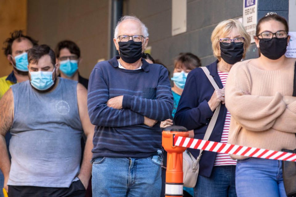 People lining up to be tested for COVID-19 at a testing clinic at Ipswich Hospital this week. Source: Getty